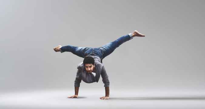 man performing handstand